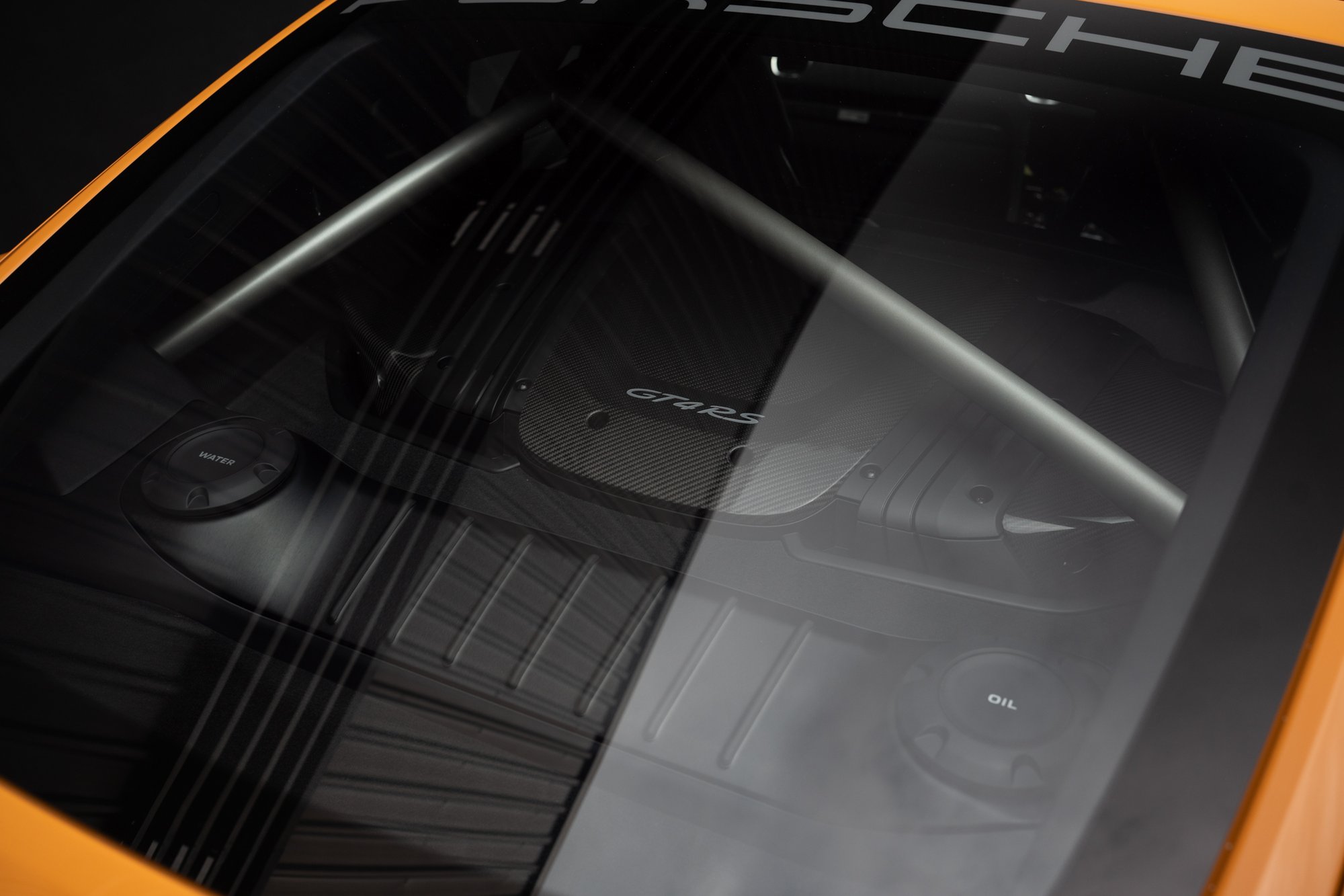 718 GT4 RS · weave left bare — Exposed carbon