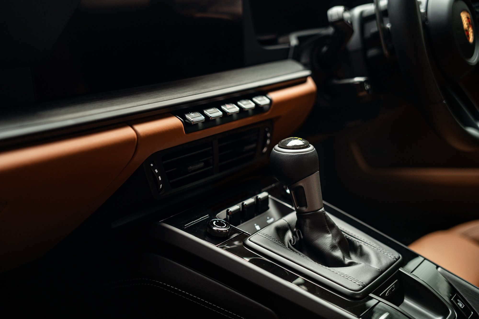 Porsche 911 GT3 Touring — cognac console and six-speed manual shifter