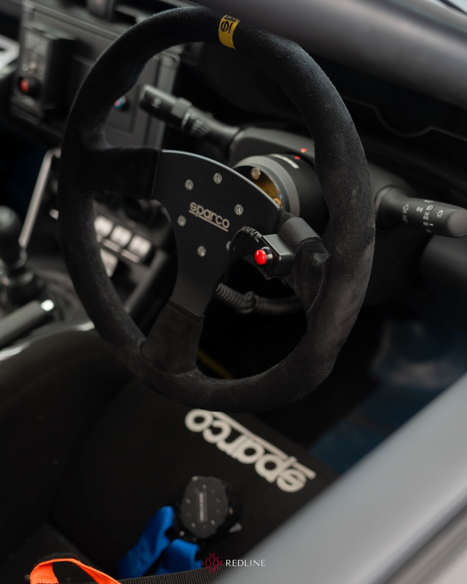 Sparco steering wheel inside the #15 GR86