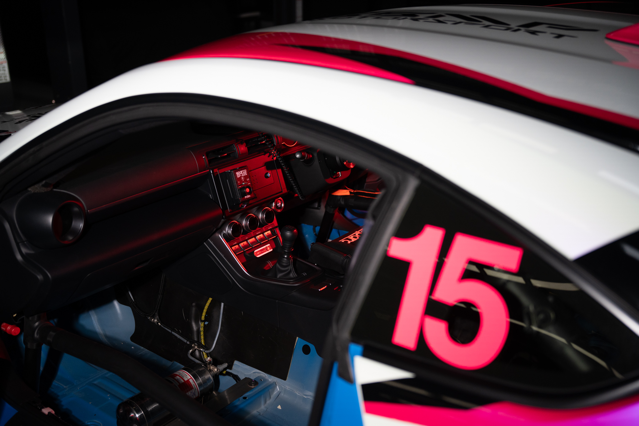 Redline GR86 cockpit through the side window