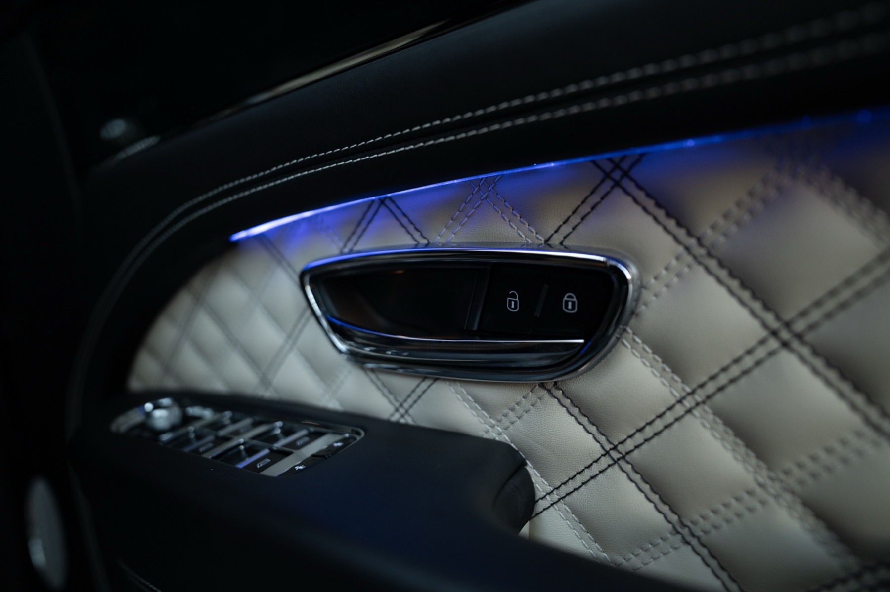 Door handle and quilted panel